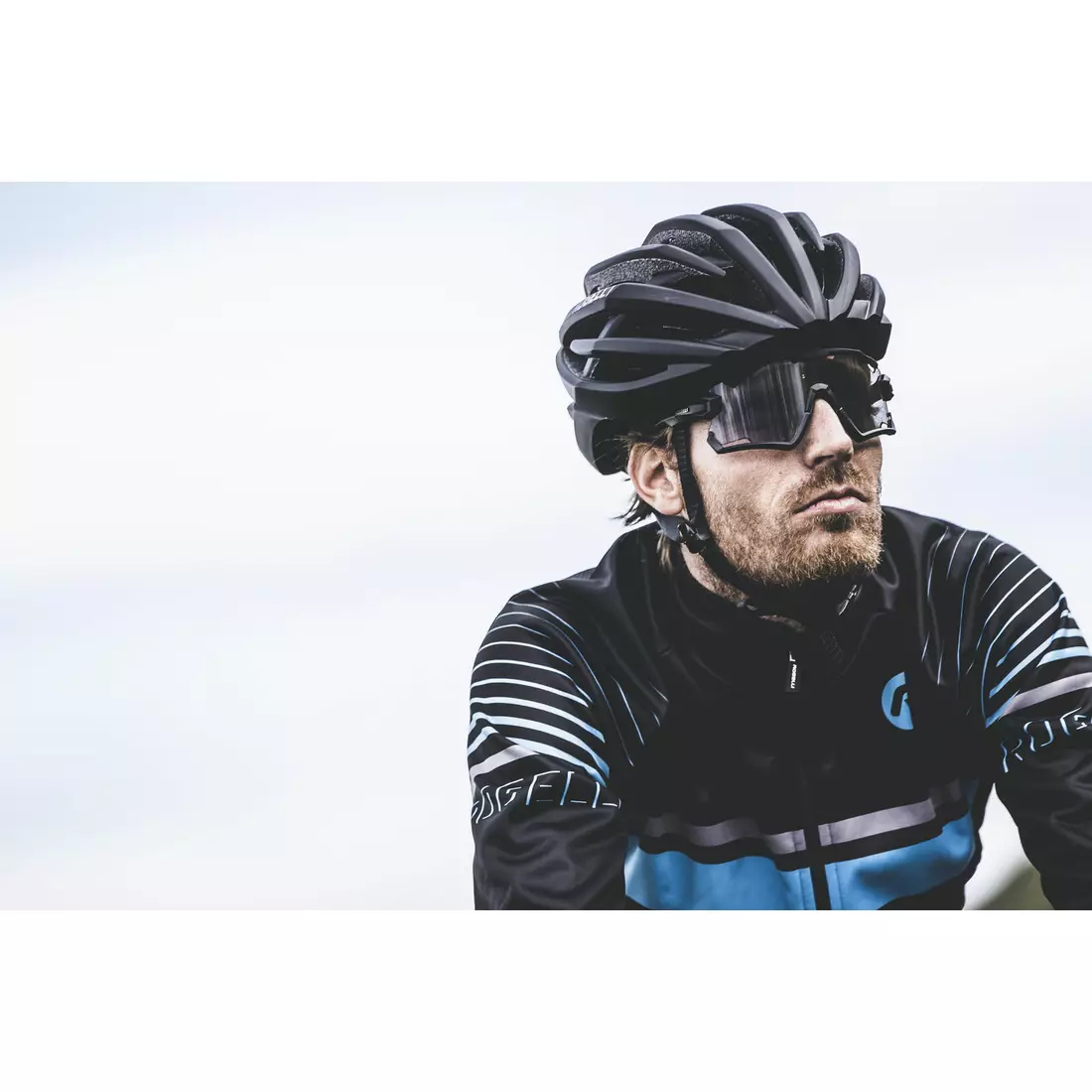 ROGELLI HERO pánska prechodná softshellová bunda na bicykel, čierna a modrá