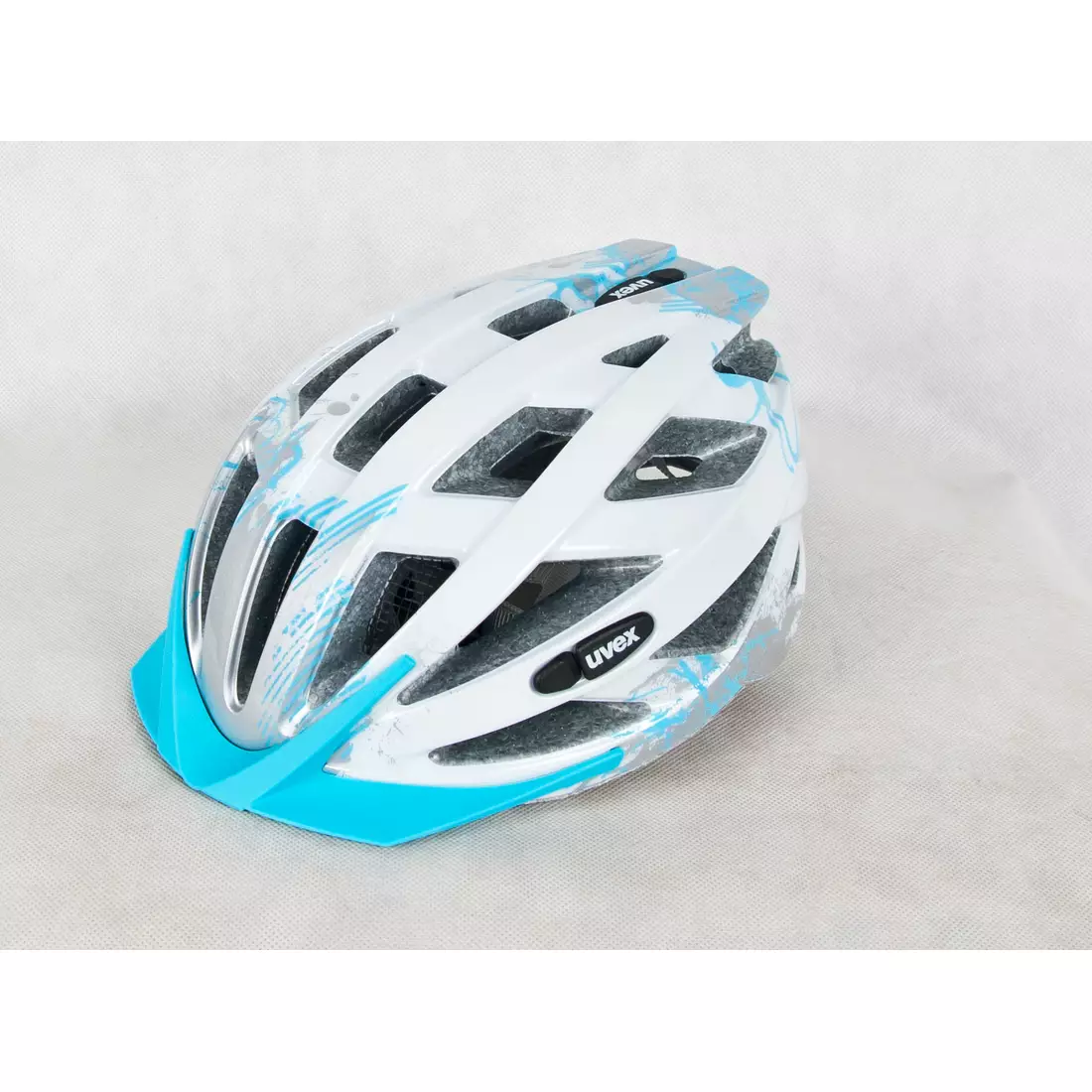 Cyklistická prilba UVEX AIR WING biela, strieborná a modrá